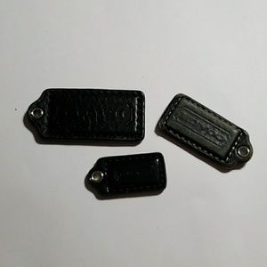 Bundle of Coach black tags